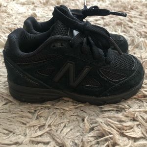 Toddler size 6.5 New balance shoes. Color: black. New without tags/box